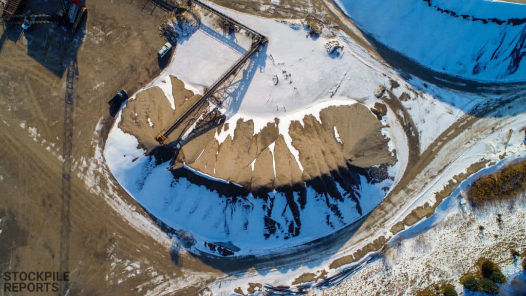 Small snow drifts tend to have little impact in stockpile measurements.