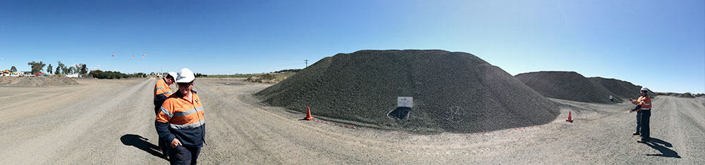 Demonstrating how to measure tightly spaced stockpiles. Notice how clean the sites are.