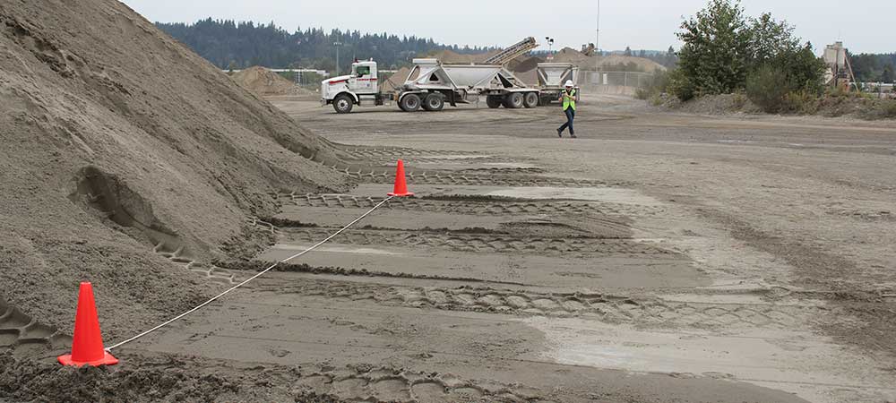 Here's a good example of how close to place the construction cones next to a stockpile for measurement.